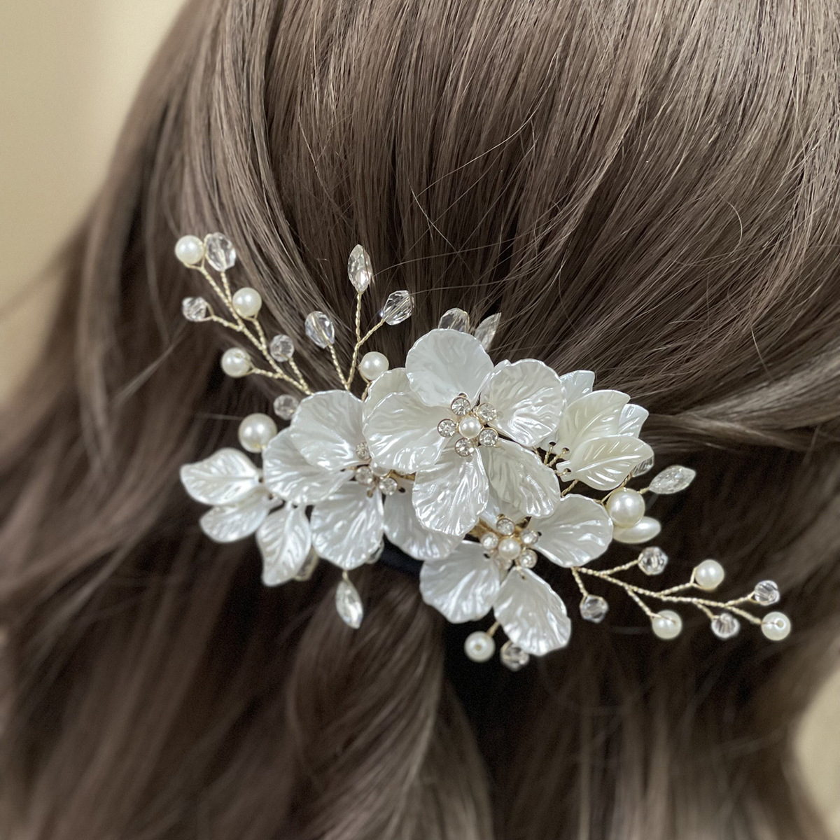 White flowers on golden thread