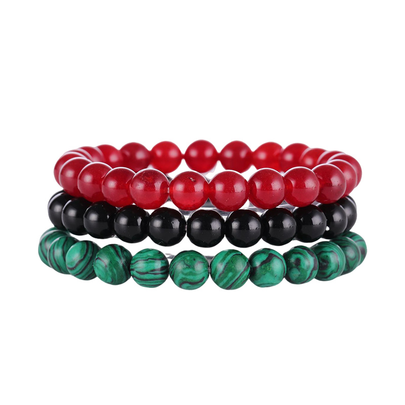 Carnelian - glossy black - green peacock