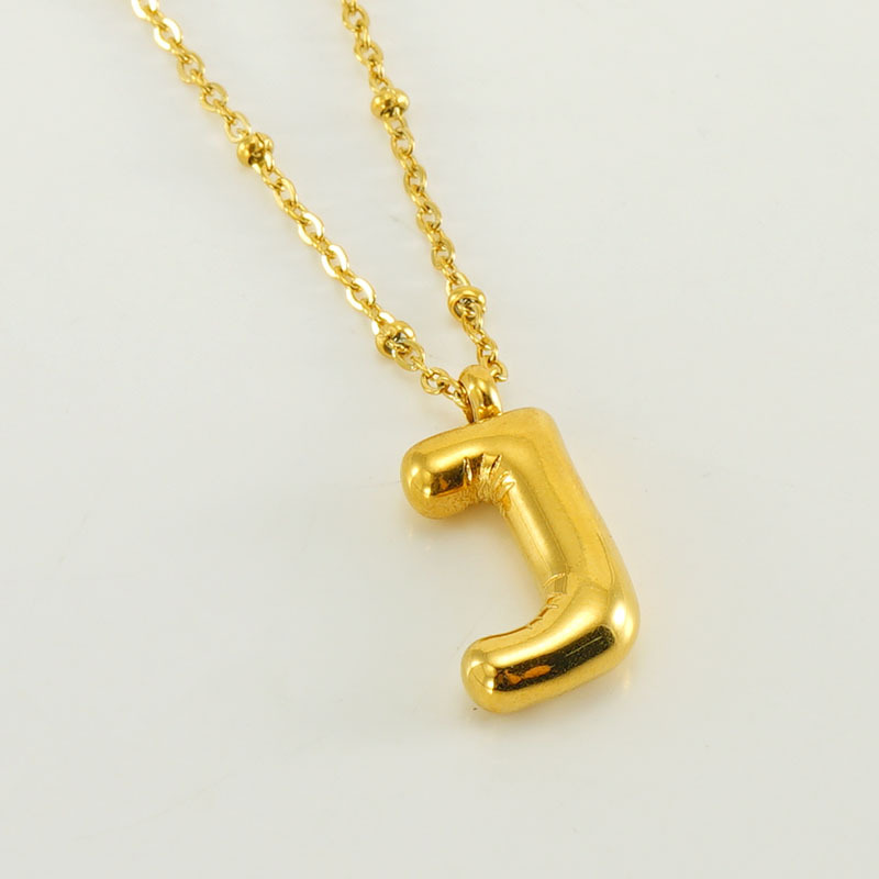 The gold letter J