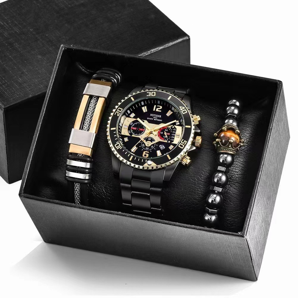 A watch, bracelet and box