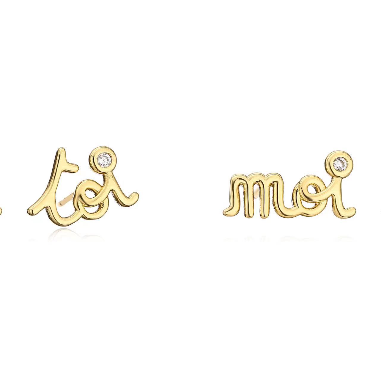 Gold toimoi earrings