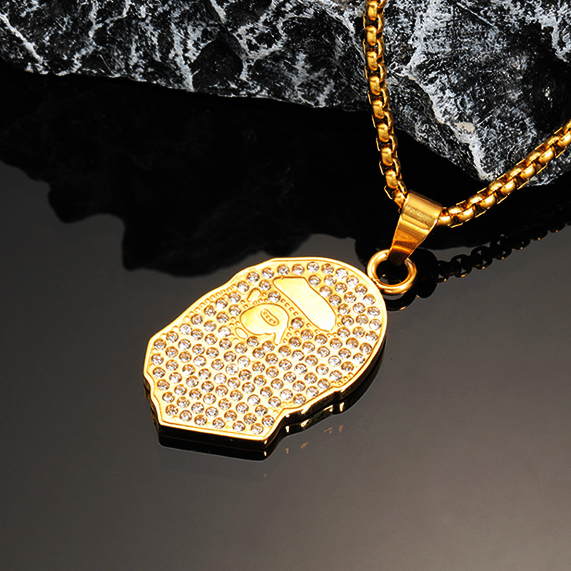 Gold and white diamond pendant