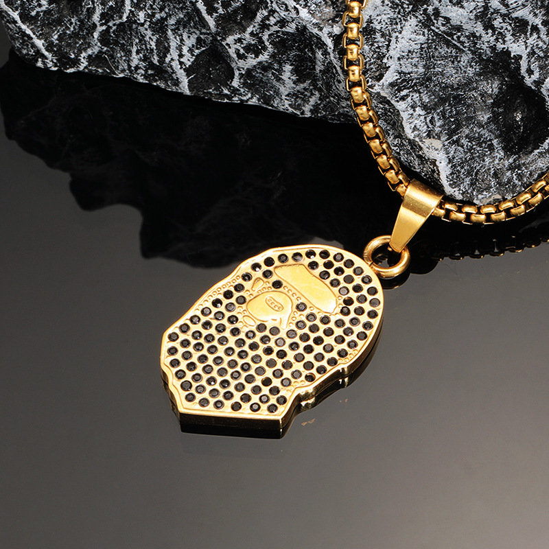 Gold and black diamond pendant