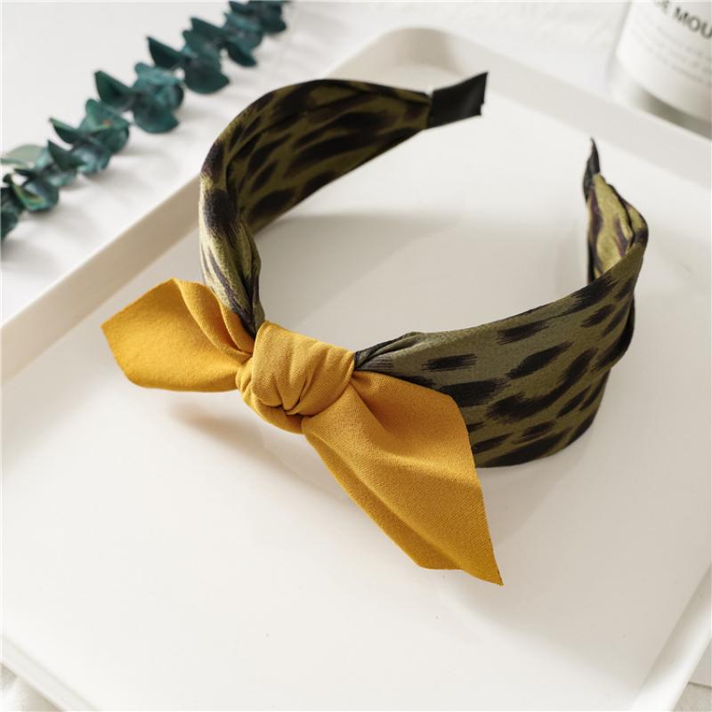 Green leopard print rabbit ear headband