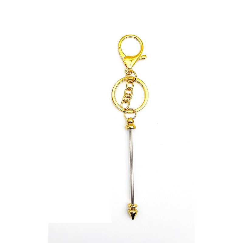 Bullet head gold + three-piece key chain