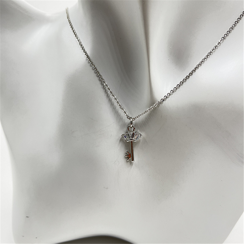 3:Platinum key necklace