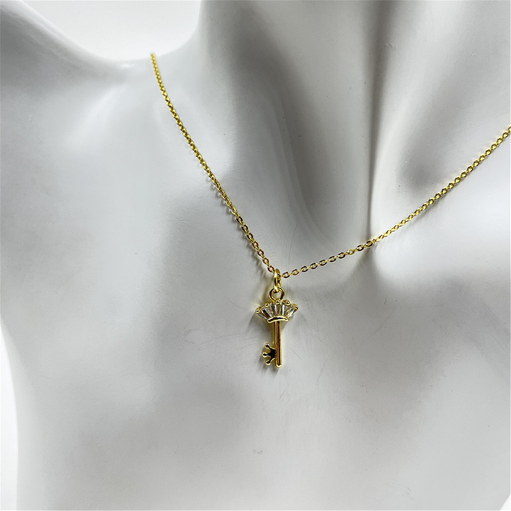 Gold key necklace