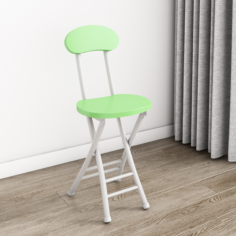 Pale green chair with white legs