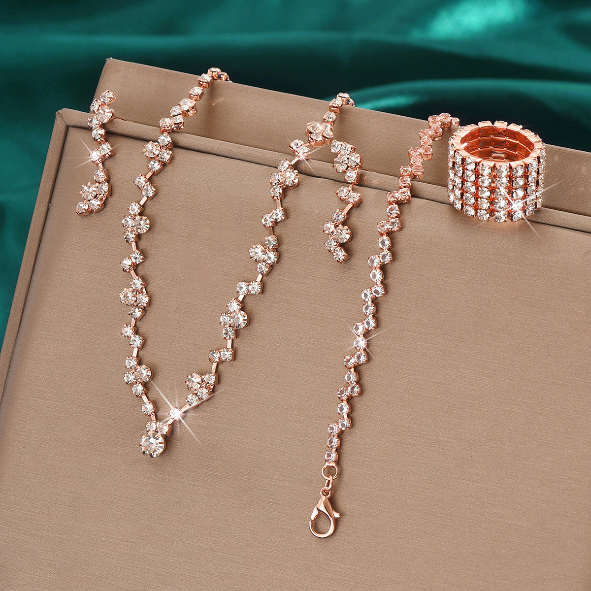 424785424-5 Rose gold necklace earrings bracelet r