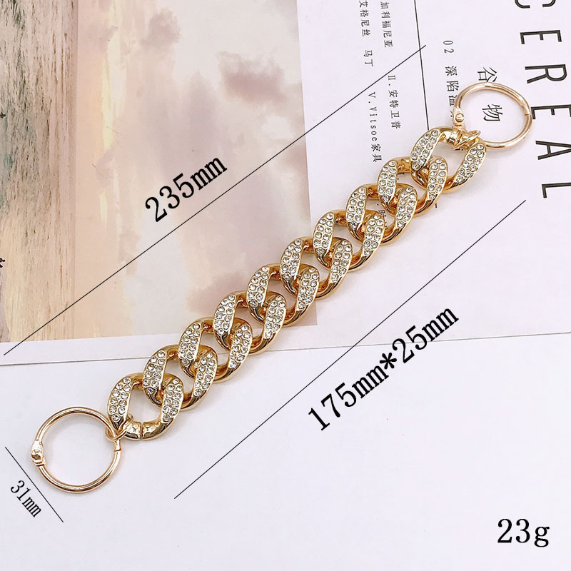 K1590-10 diamond-set acrylic (gold) hanging buckle