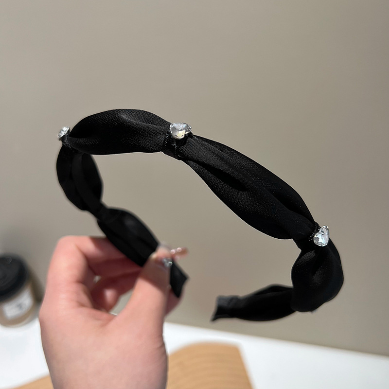 Black rhinestone headband以上翻译结果来自