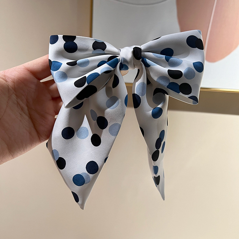 Polka dot bow hair clip