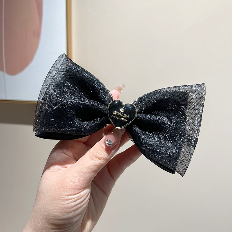 Black heart bow clip