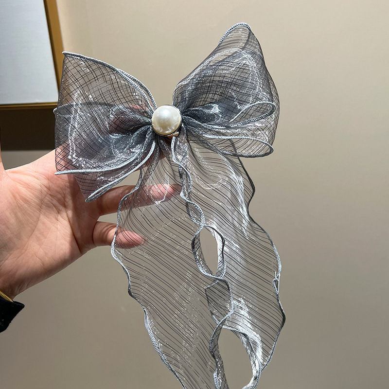 Gray bow streamer hair clip