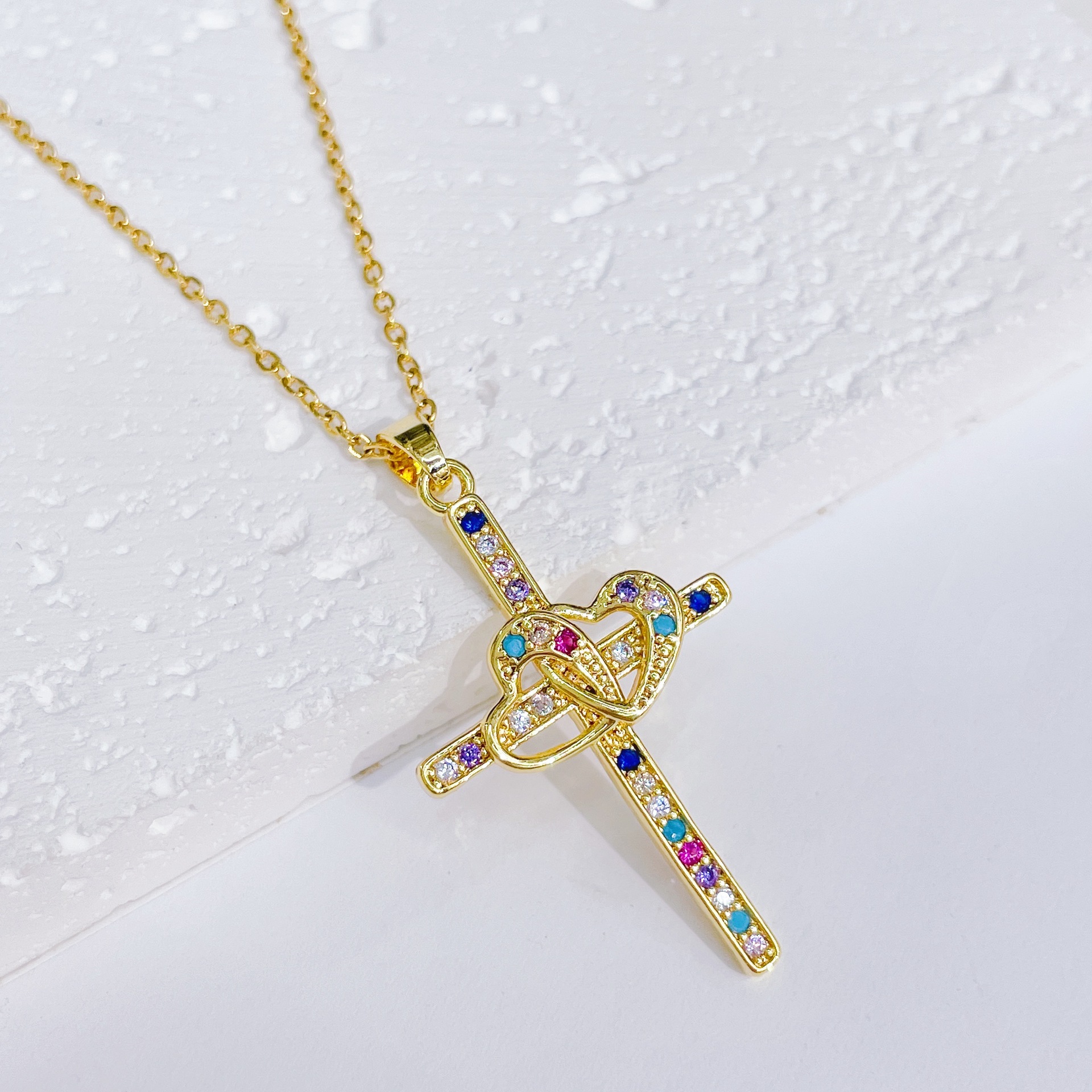 Colored zirconium love cross