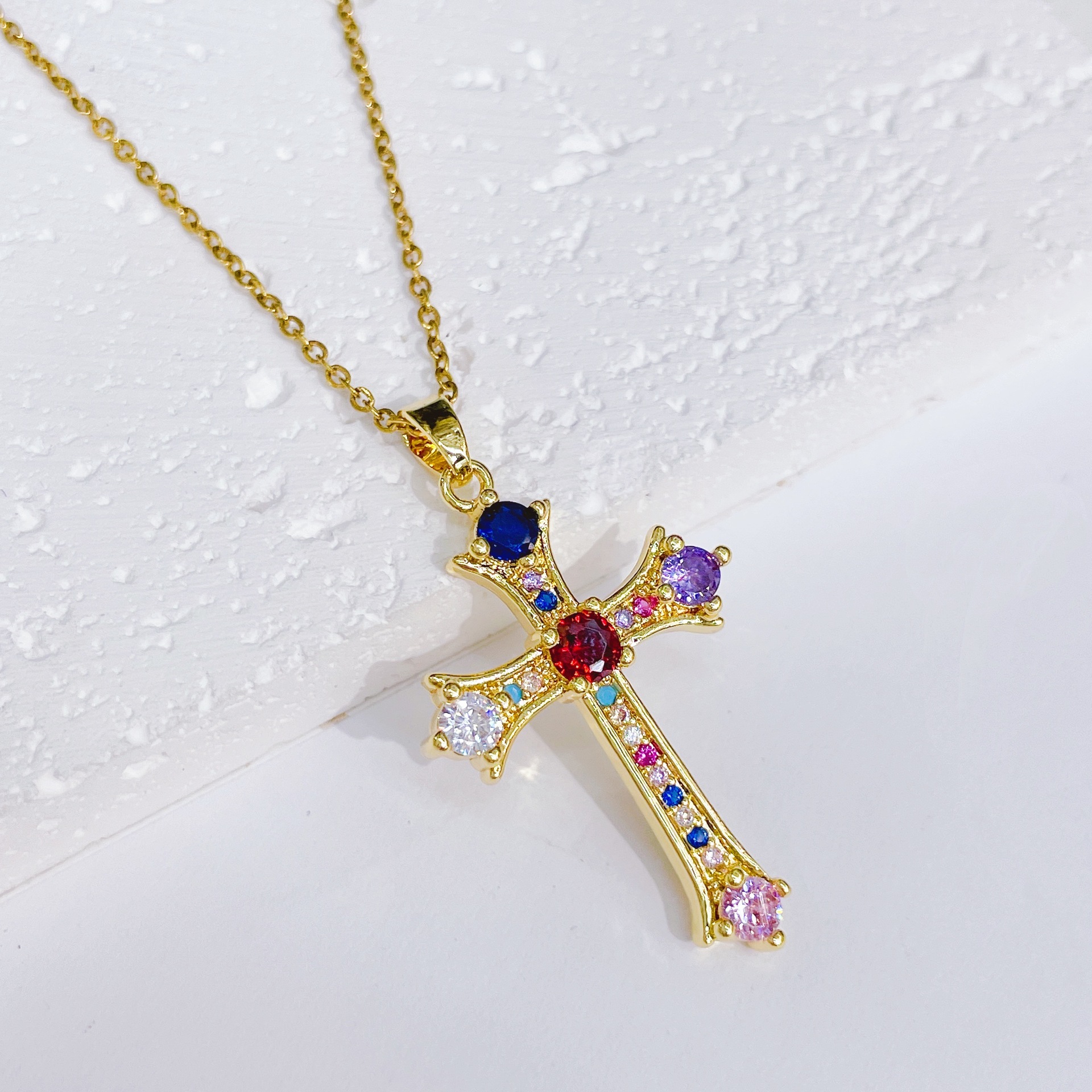 Colored zirconium cross