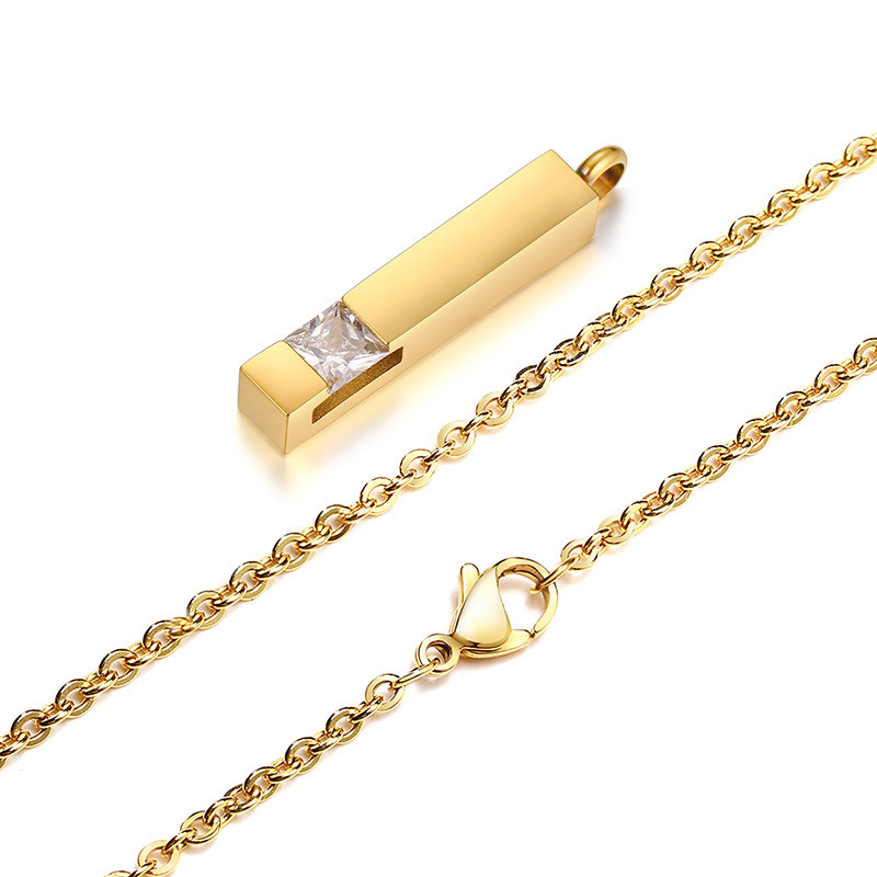 Gold pendant with white diamond and matching chain