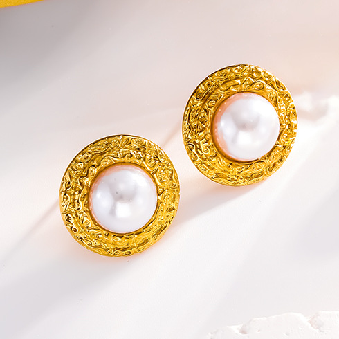 Gold stud earrings