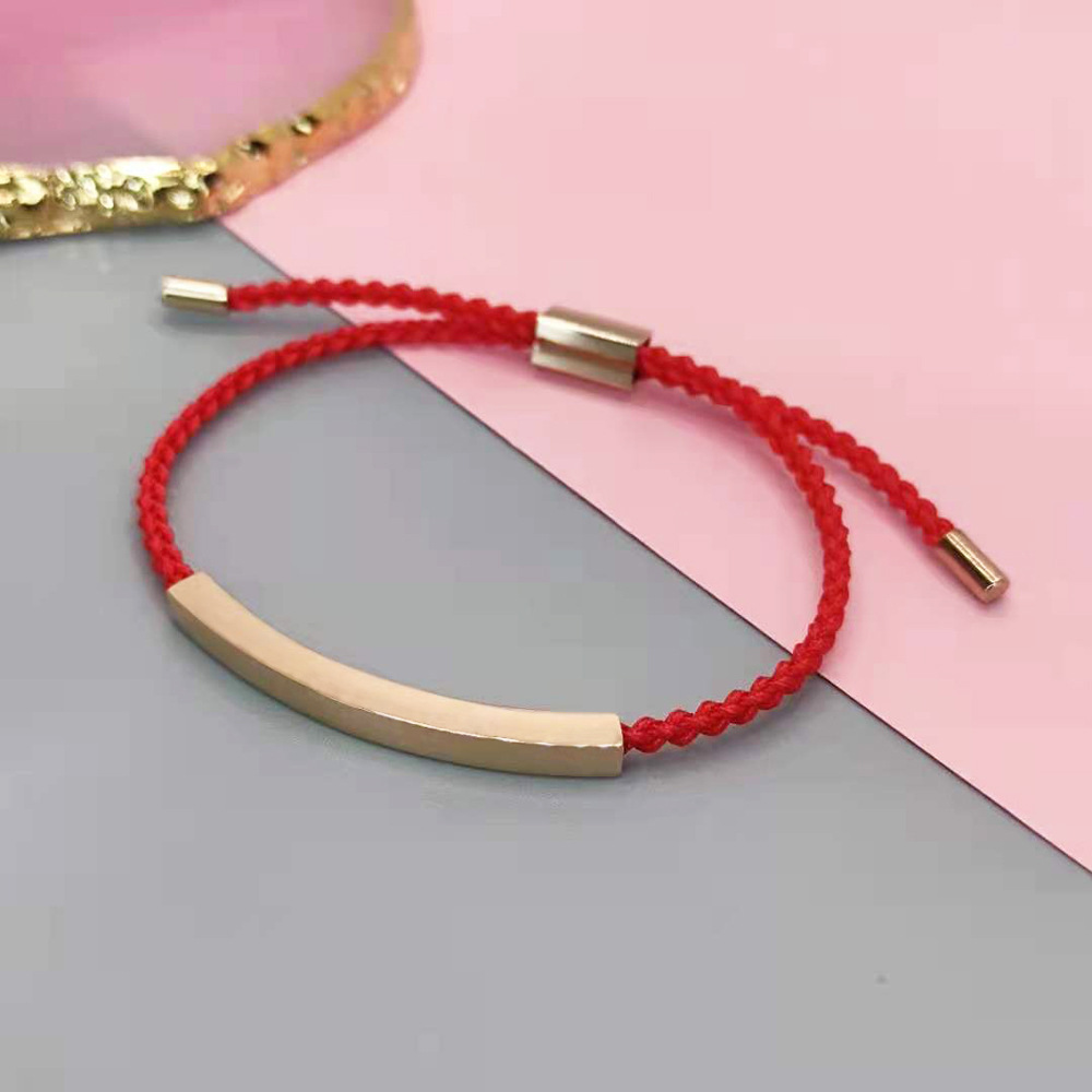 Rose gold + red rope