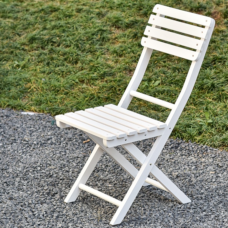 White folding chair free of mounting folding