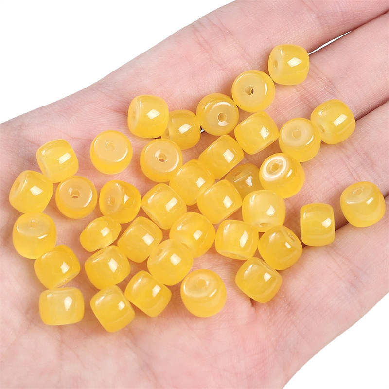 25:drum beads ginger 8x6mm