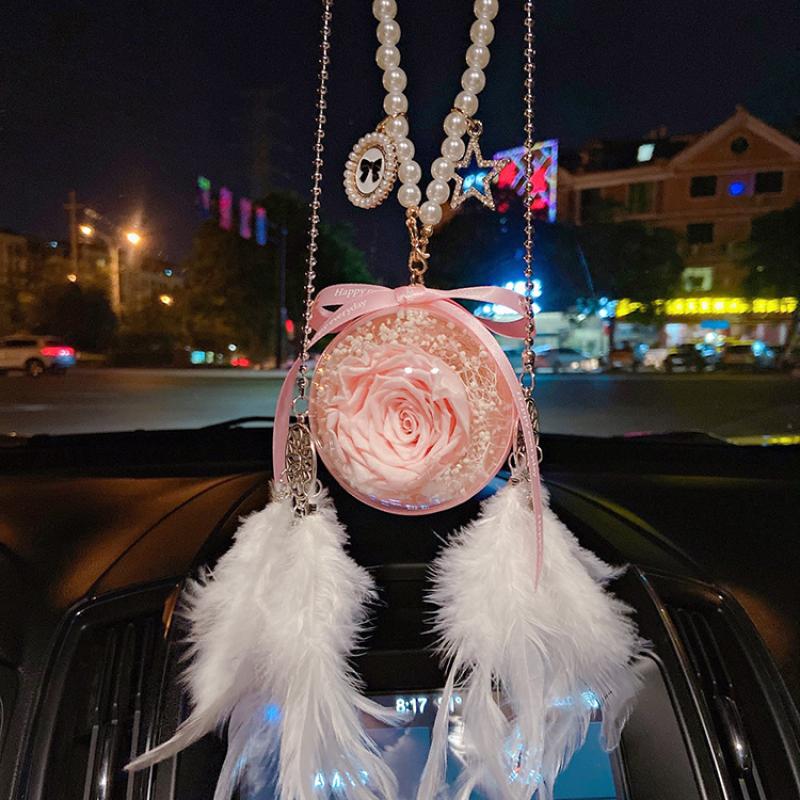 Pink + feather dream catcher