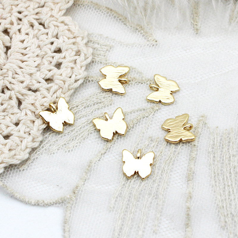 5:Butterfly 8.8 * 8.9 mm gold