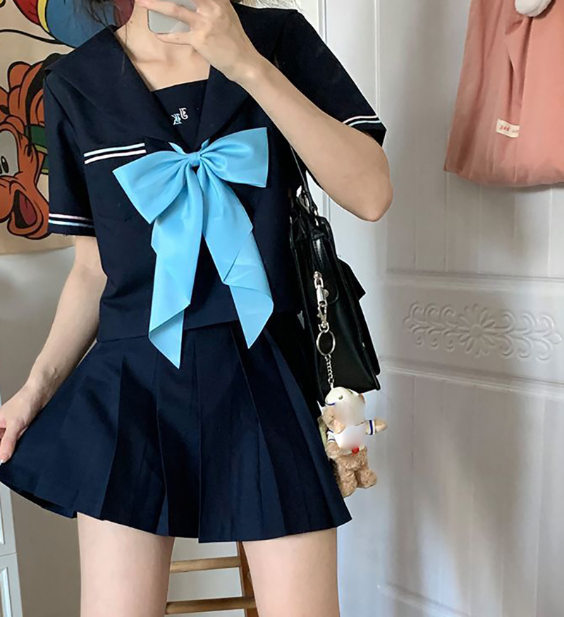 Short sleeve top   navy blue skirt   blue bow tie