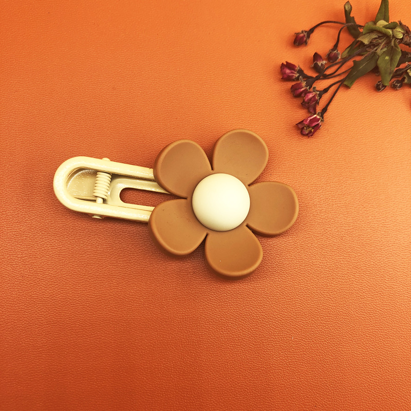 Brown round flower hair clip