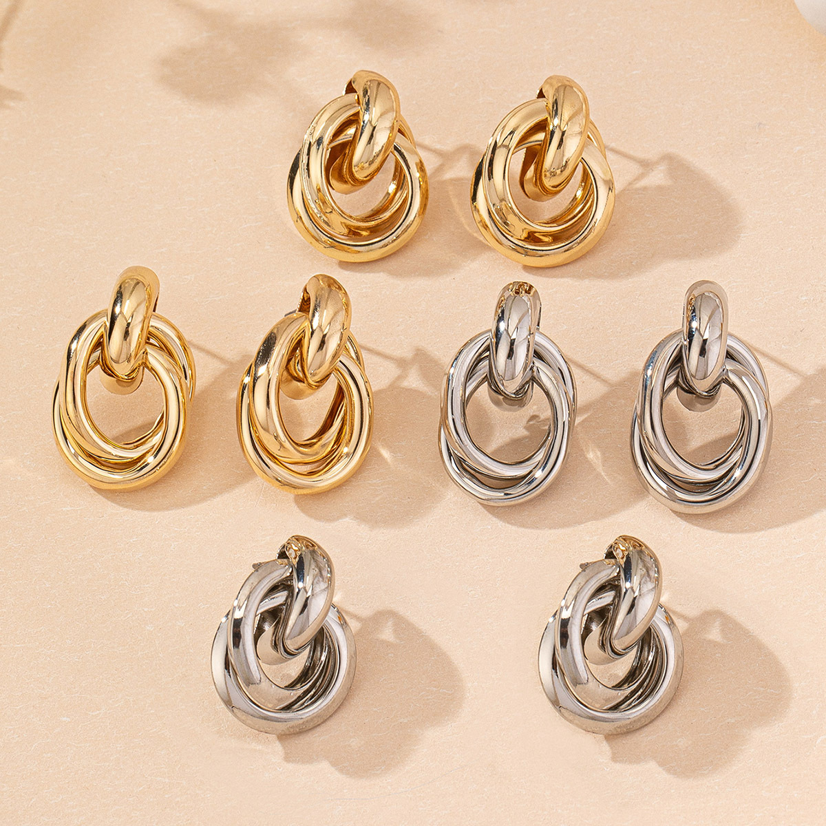 Gold and silver round oval earrings 4-piece set