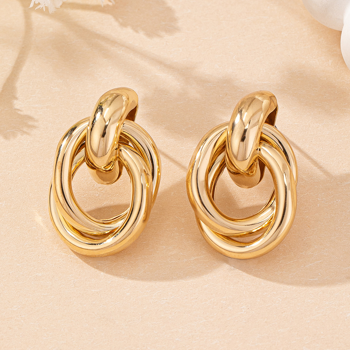 Gold oval stud earrings