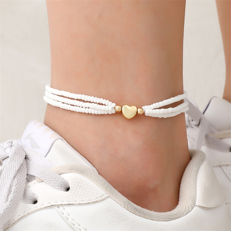 12:white anklet