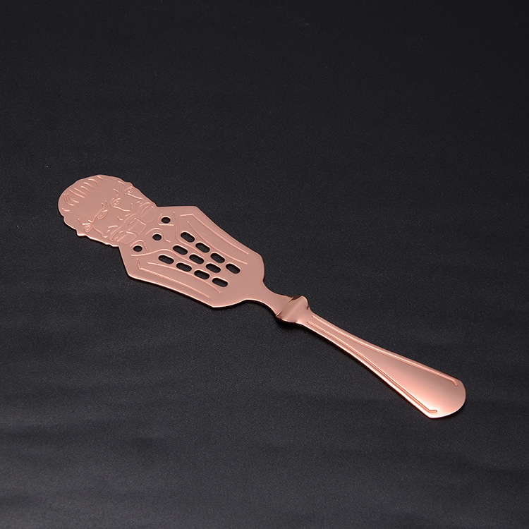 Head absinthe spoon copper plated