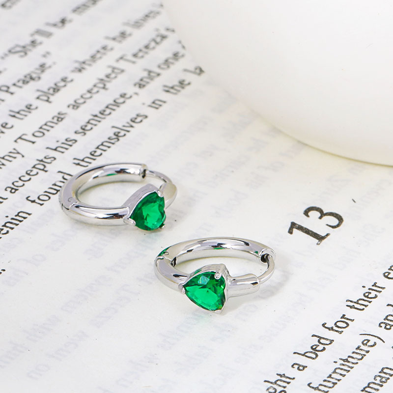 Green diamonds. - Silver stud earrings