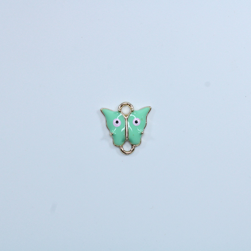 Double hanging k gold-cyan