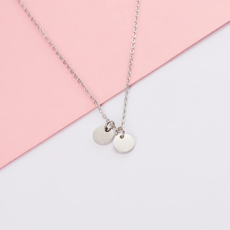 3:Steel color necklace (plus two discs)