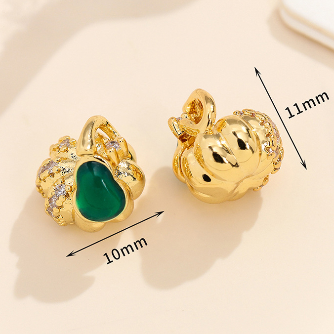 37:37 gold pumpkin with green zirconium pendant