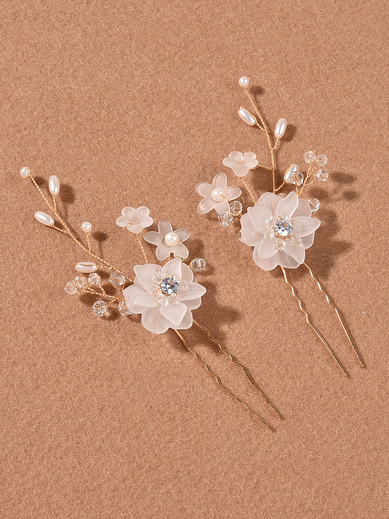 Style a pair of golden hairpins