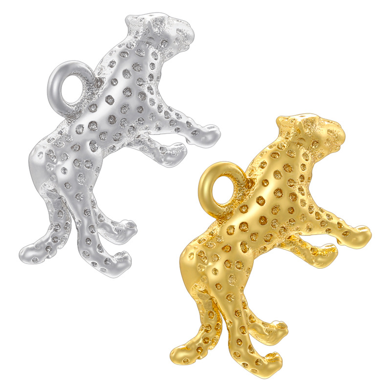 3:1 pair of gold and white leopard pendants