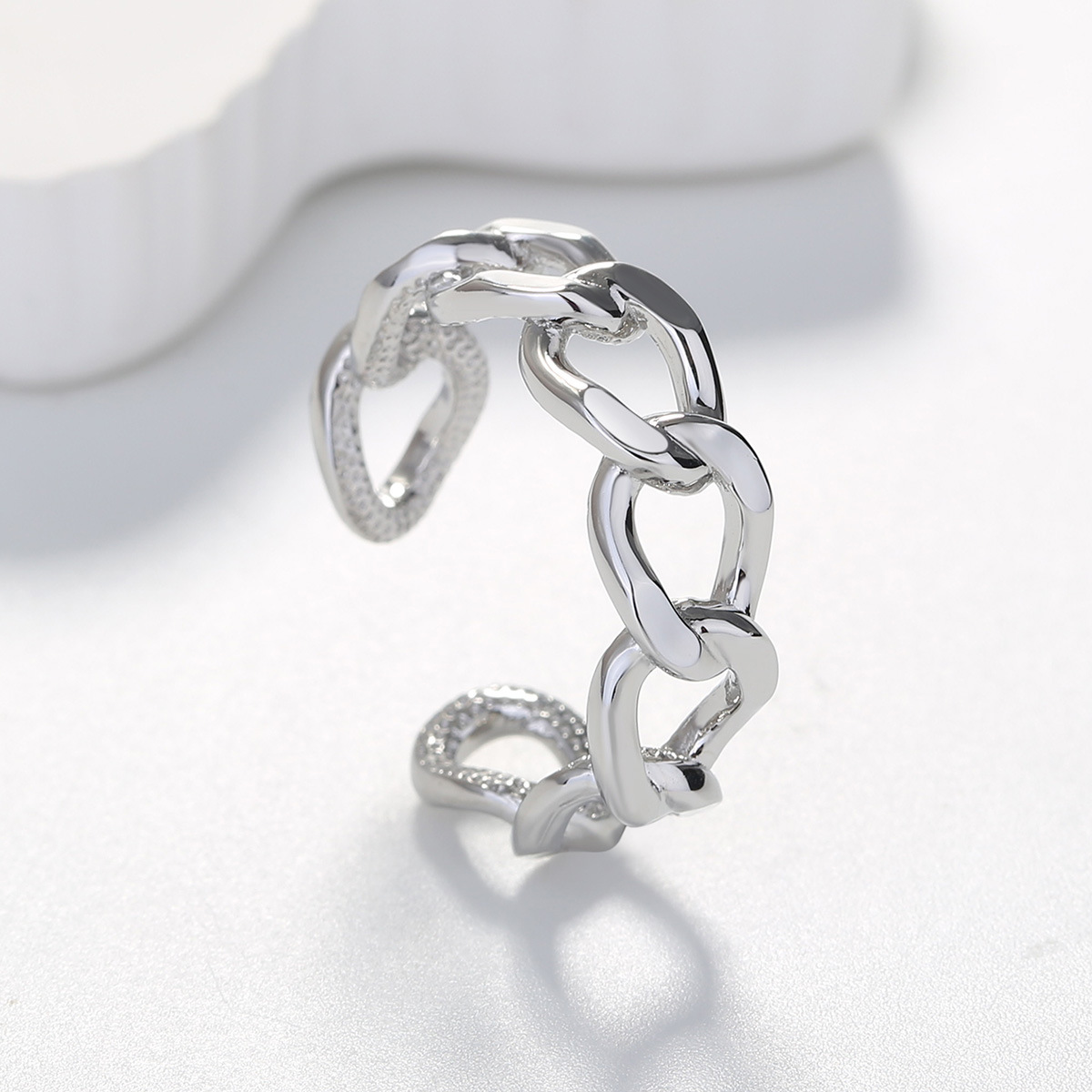 7:Cuban chain link ring (large white gold)