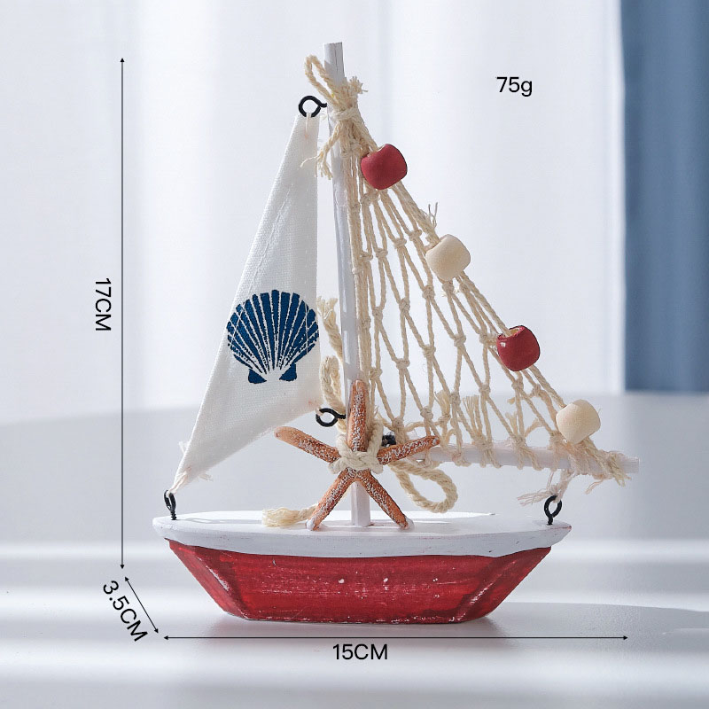 17cm sailboat with red bottom and yellow starfish