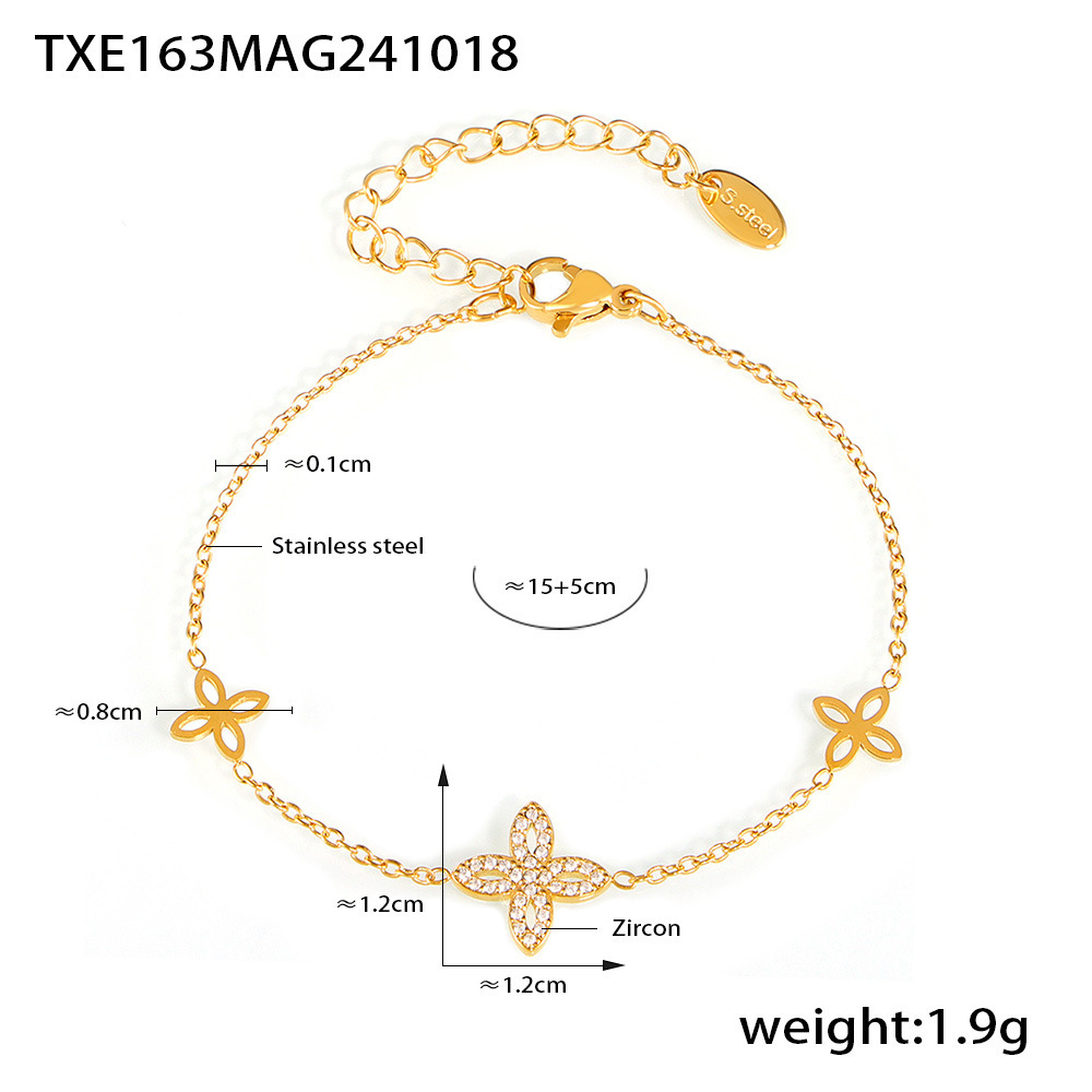 3:Txe163-gold four-leaf flower zirconia bracelet