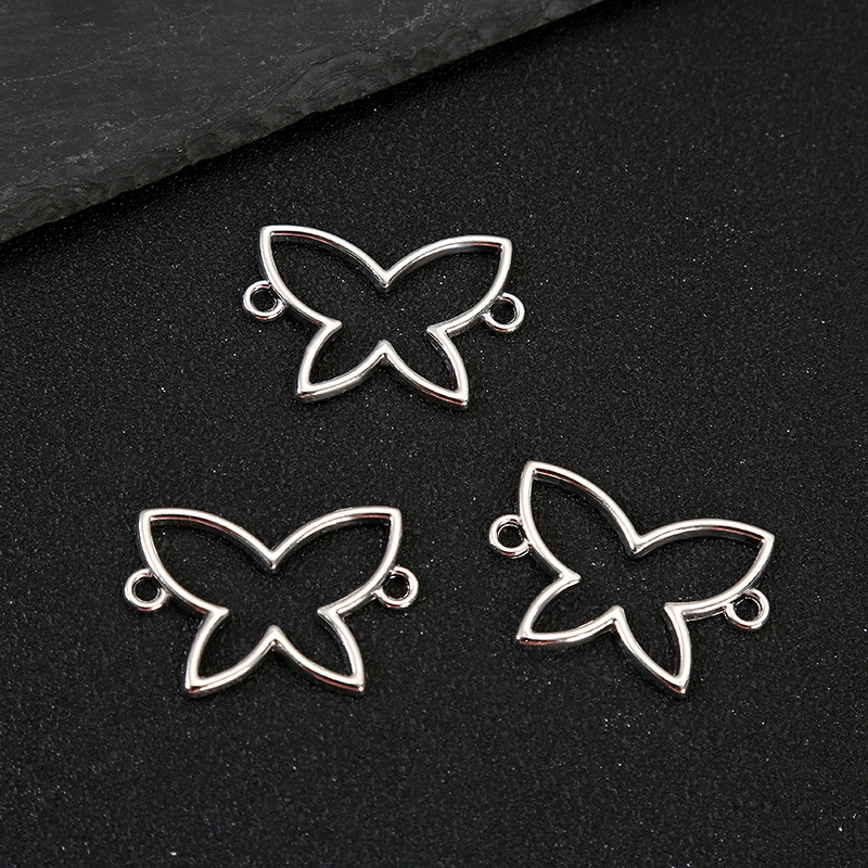 1:Hollow butterfly (about length: 3.2cm width: 2.5cm thickness: 0.15cm)