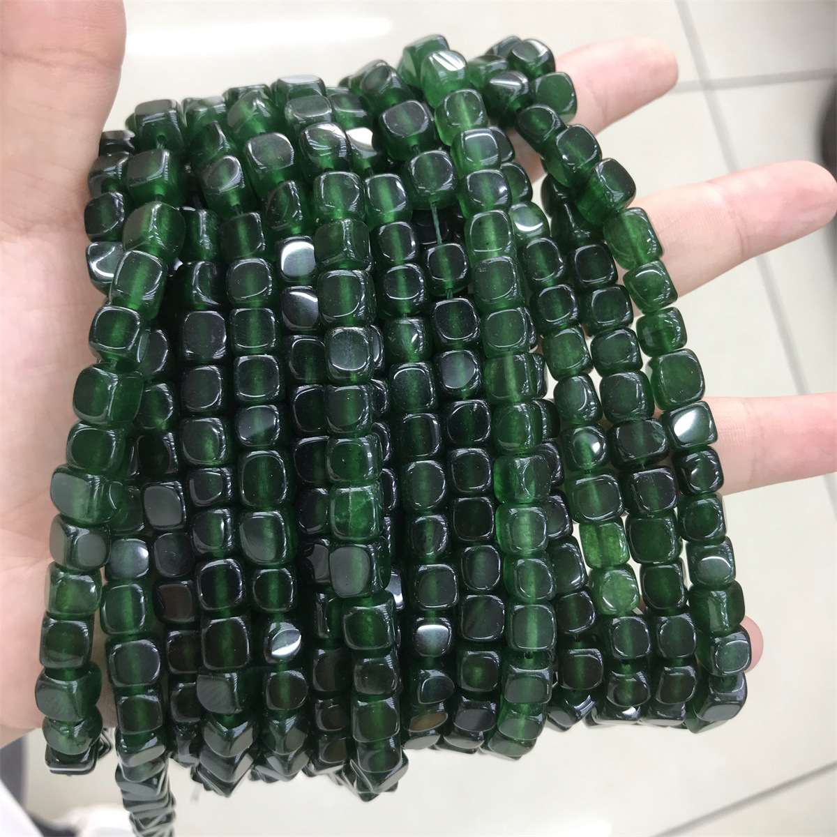 33:33-dark translucent green jade