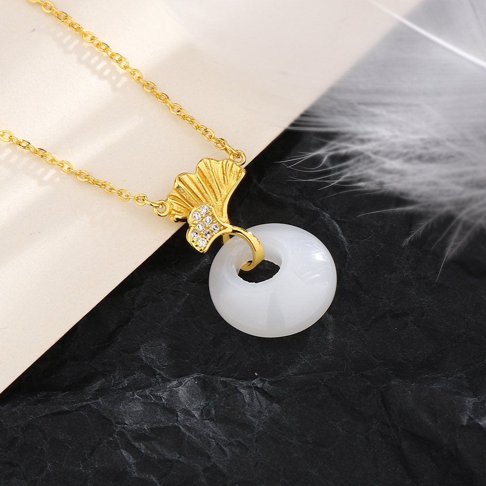 2:White jade sansheng has apricot necklace (gold color)