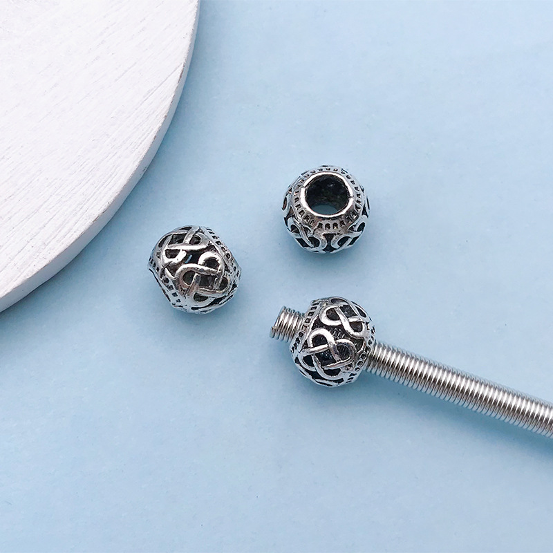 3:1 Ancient silver hollow flower-shaped large hole beads 9*11 hole 4.8 mm-16634-1.2g