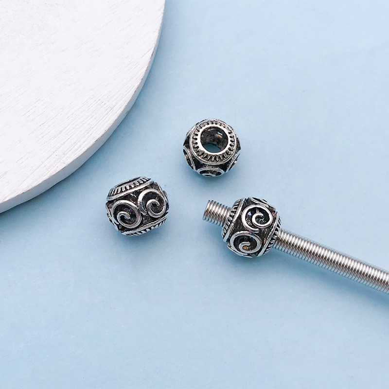 7:1 Ancient silver hollow flower-shaped large hole beads 9*11 hole 4.8 mm-16638-1.1g