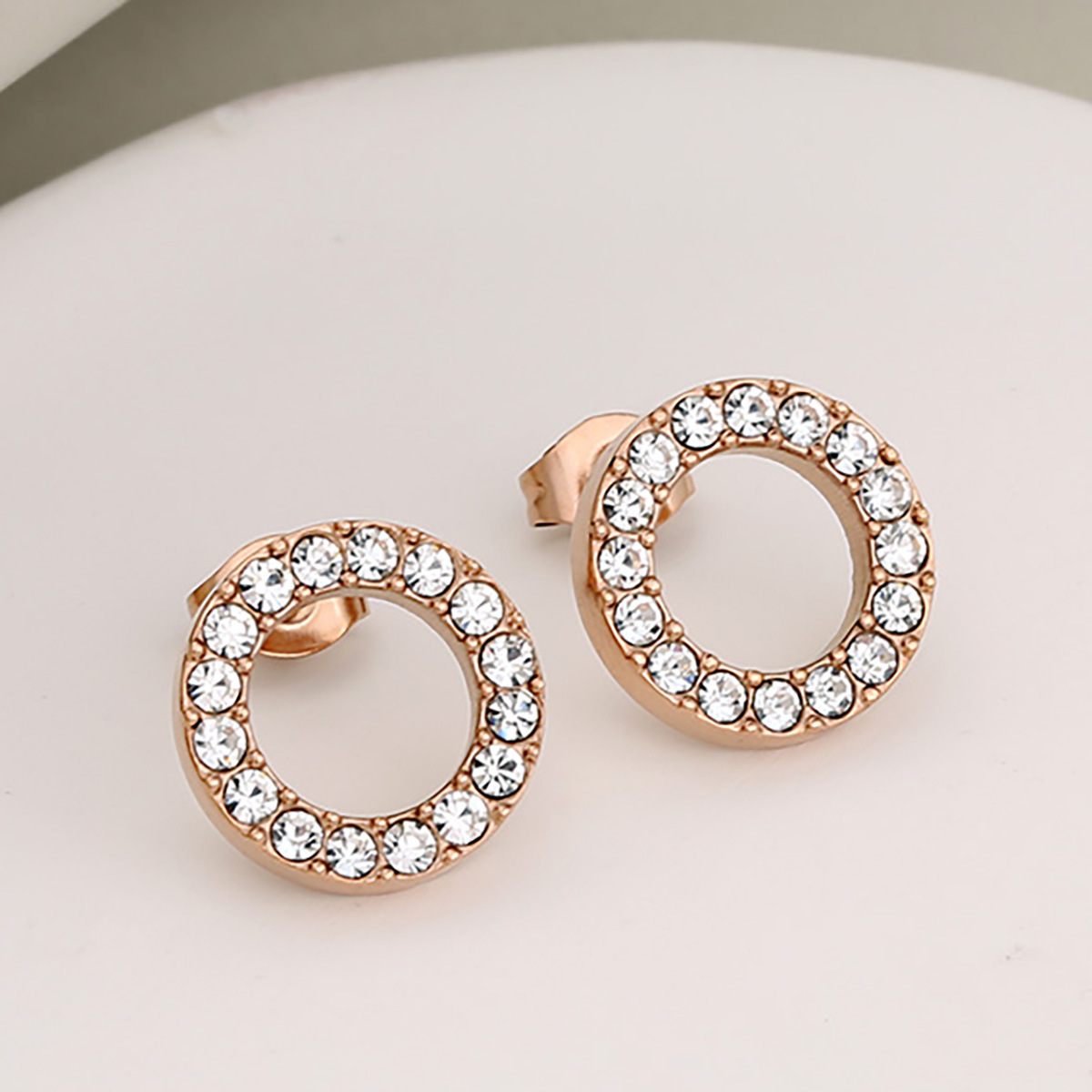 Rose gold - White stone