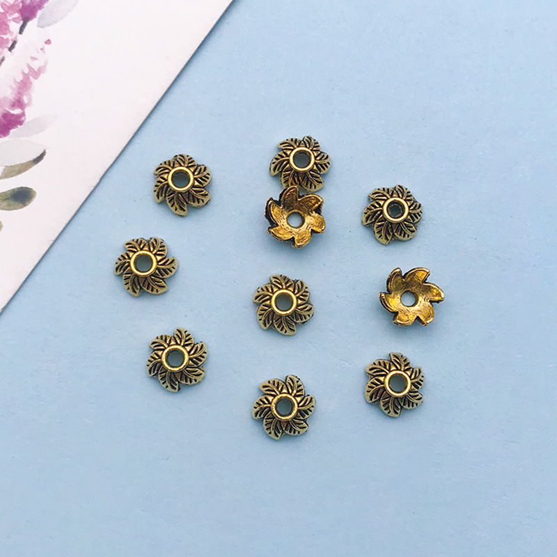 3:1 antique gold flower-shaped flower hat 7*7 holes 1.8 mm-16603-0.3g