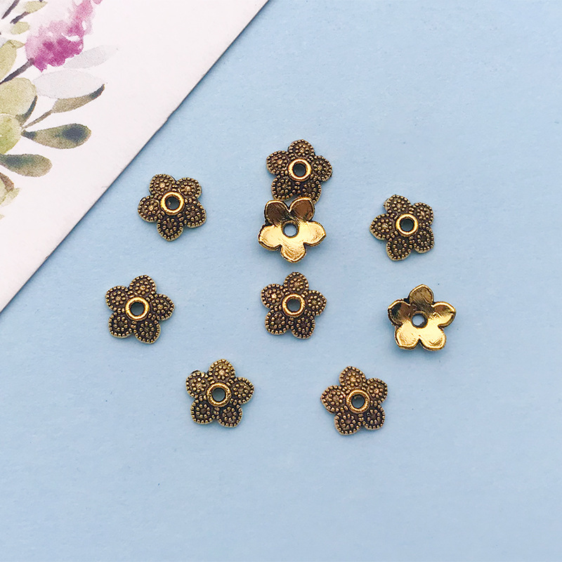 4:1 antique gold flower-shaped flower hat 7*7 holes 1mm-16604-0.2g